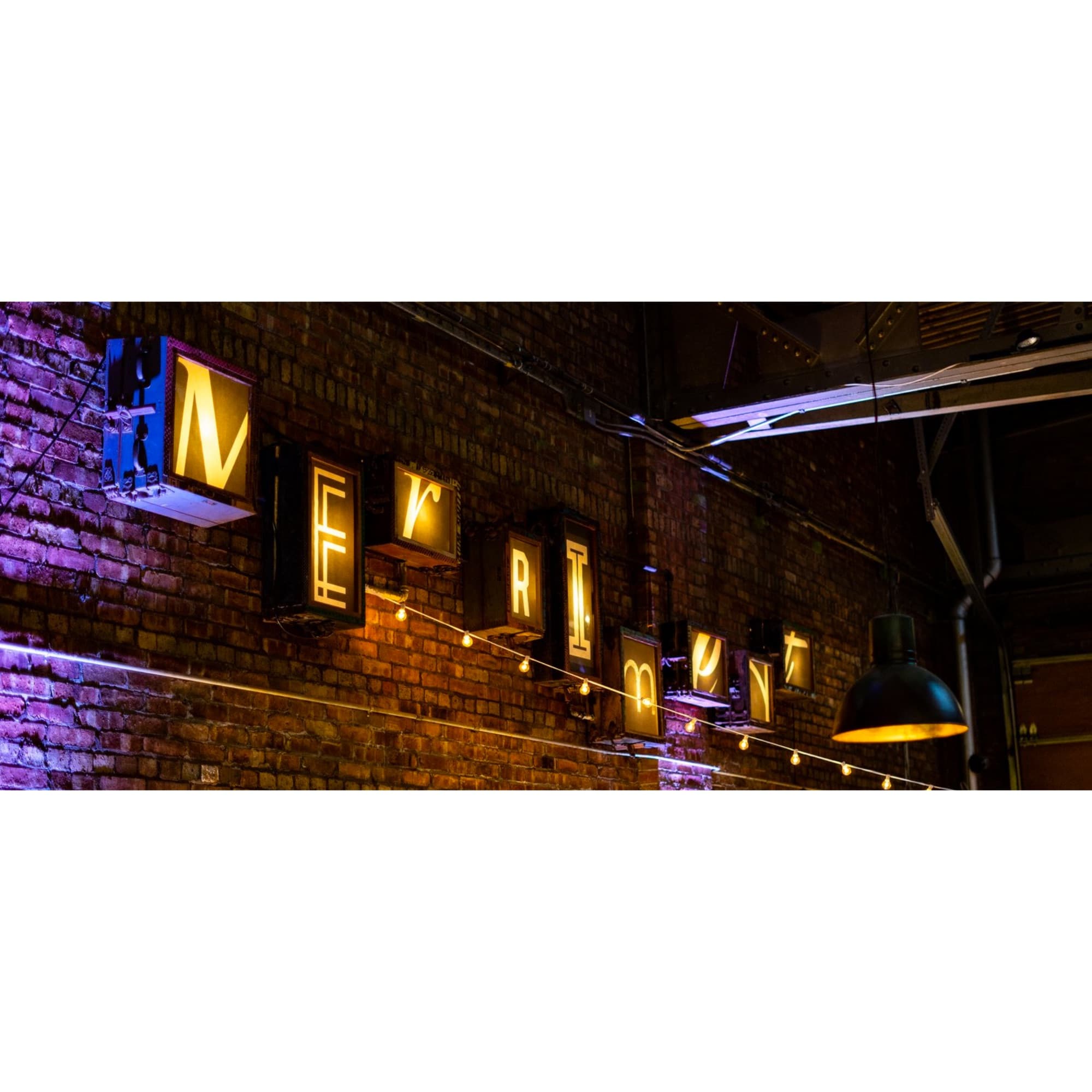 Merriment Social exterior at night